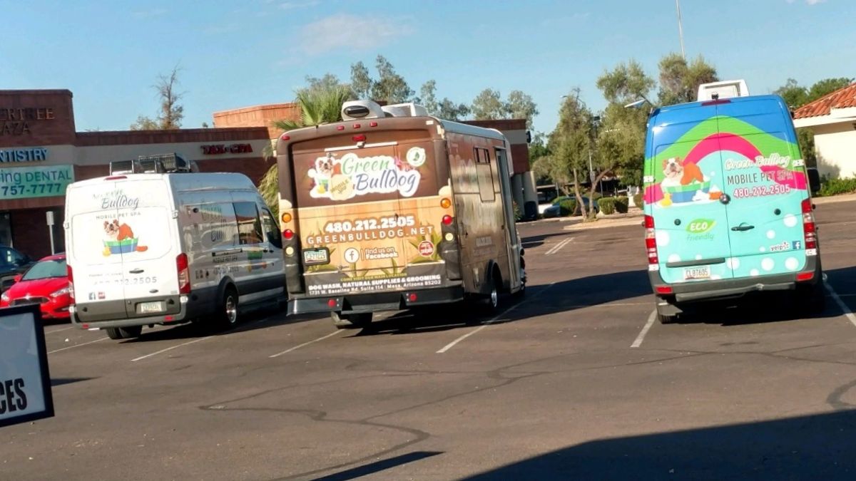 Green Bulldog mobile grooming vans